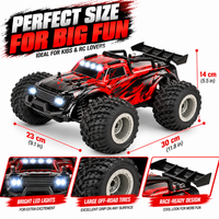 Side view of a 1:18 scale big wheel RC truck with oversized tyres.