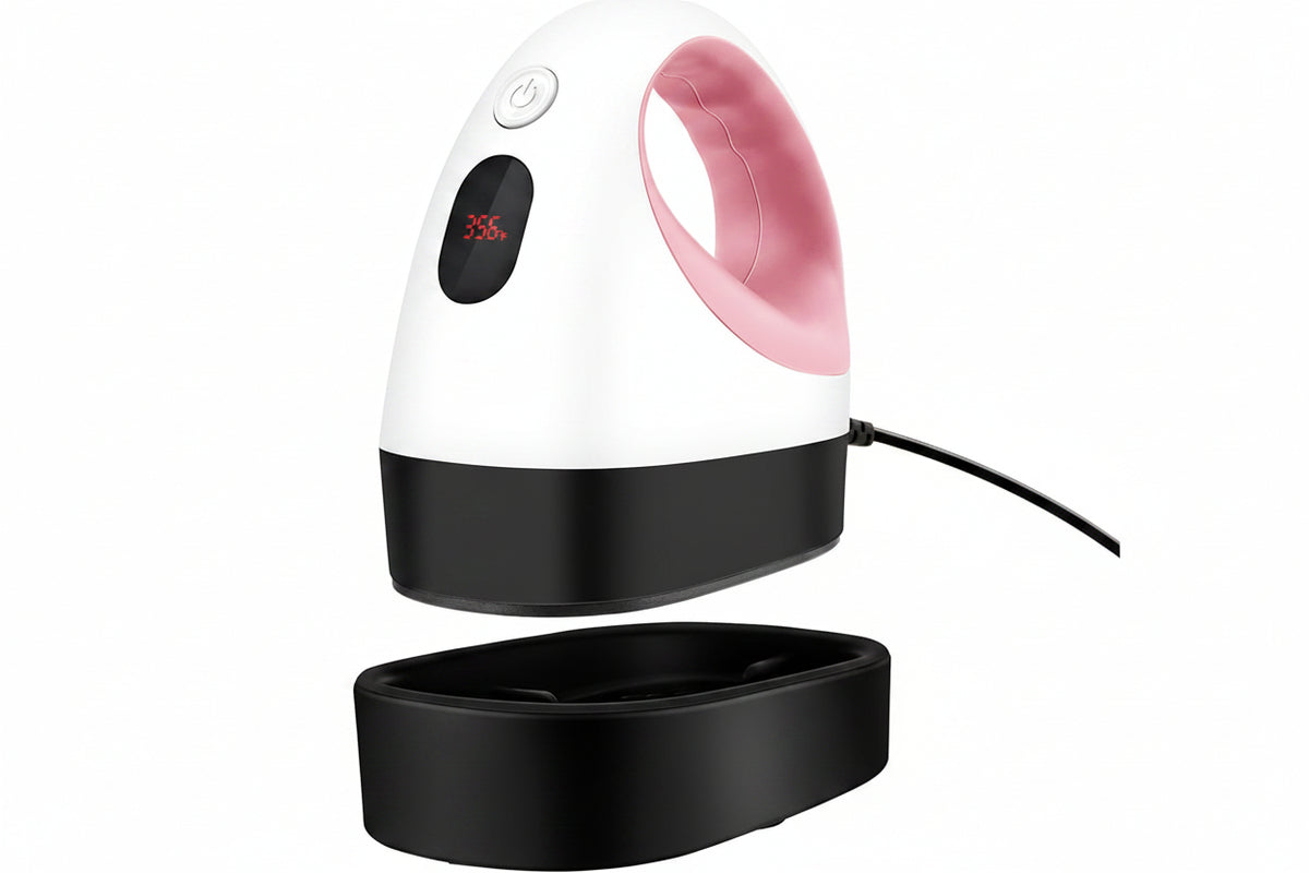 Mini heat press machine in white and pink for fabric crafts