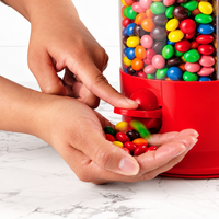 Rotating candy holder with a 360-degree design for convenient access to stored treats.