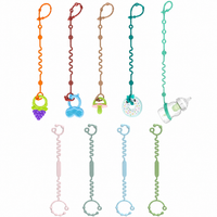 Adjustable baby toy straps and pacifier holder clips in assorted colors for everyday baby accessories.