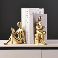 Side view of aesthetic gold ceramic book holders for shelves