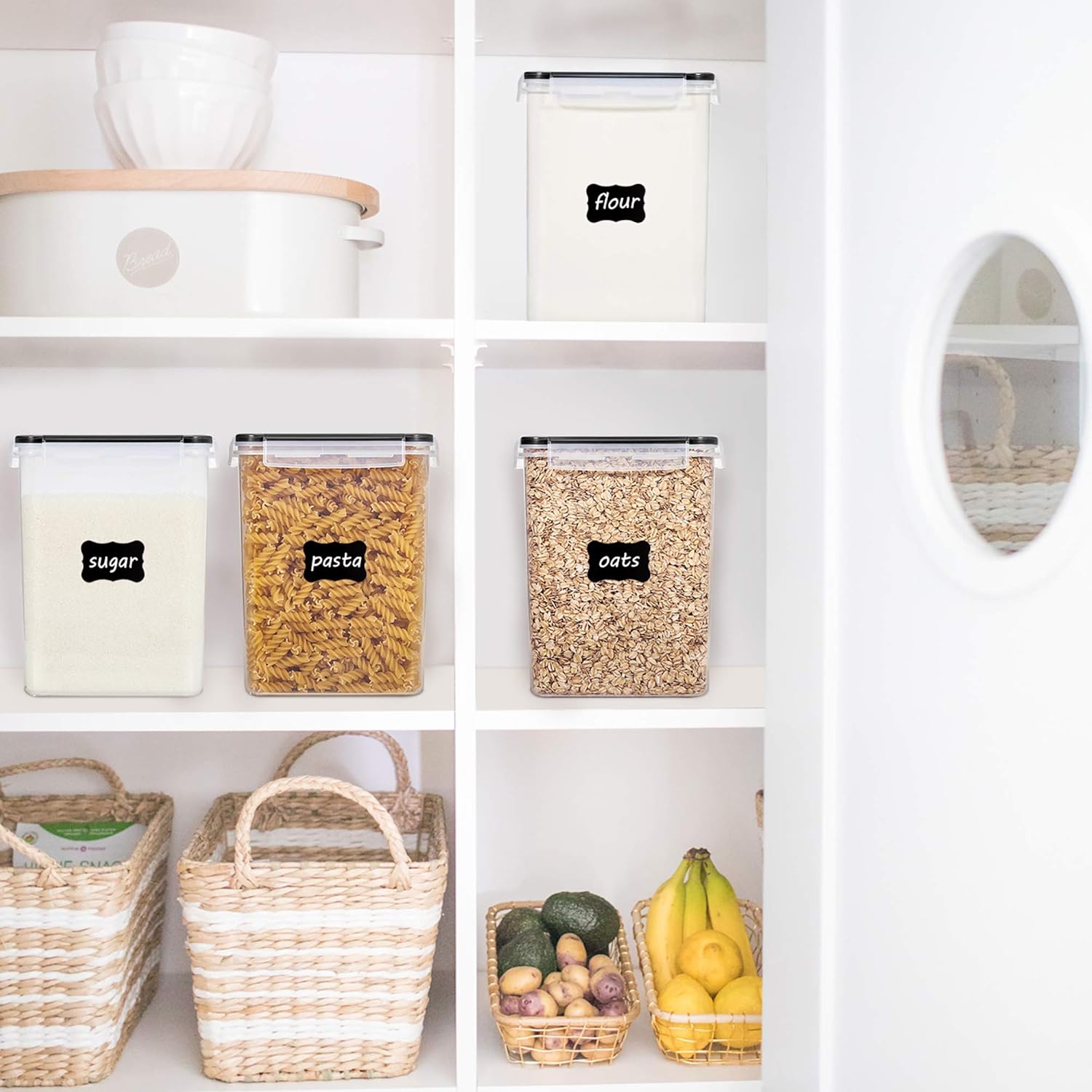 Plastic canisters storing rice, cereal, and baking supplies