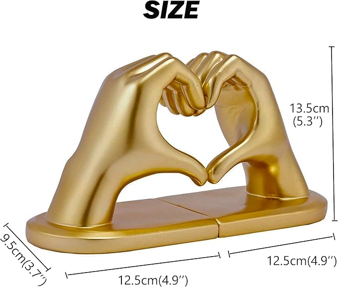Artistic gold bookends displayed on a bedroom bookshelf