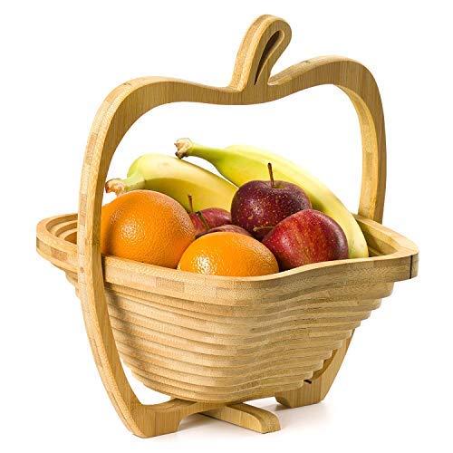 Assorted dried fruit gift basket arranged on a reusable wooden tray