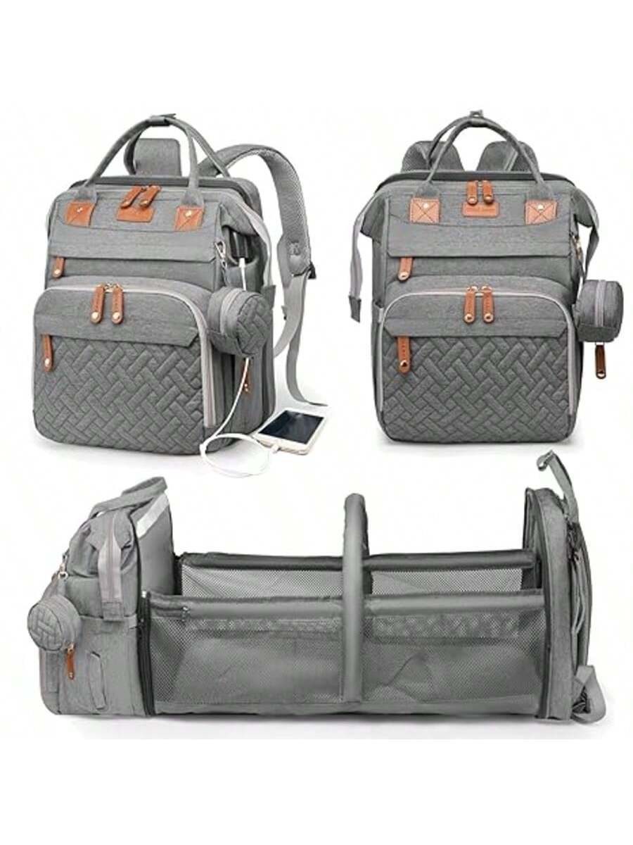 Baby diaper bag backpack with changing station, built-in changing pad for diaper changes on the go.