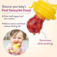 Baby Using Food Feeder Pacifier for Teething Relief