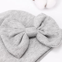 Baby girl newborn accessories set with soft cap and mittens