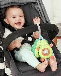 Baby hanging avocado toy, soft and colorful sensory toy for infants.