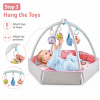 Baby play mat with four hanging animal activity toys
