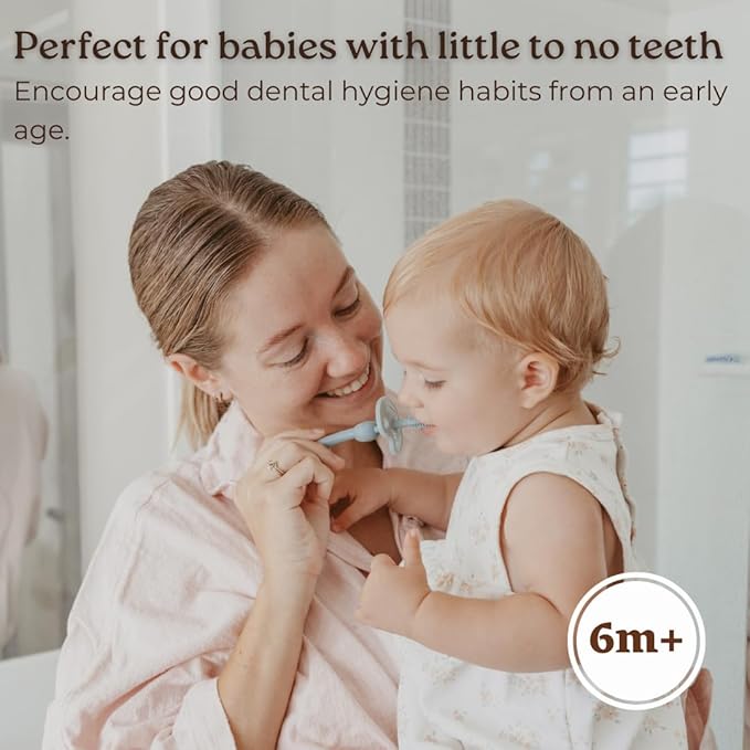 Baby toothbrush with ergonomic handle, easy to hold for parents during brushing.