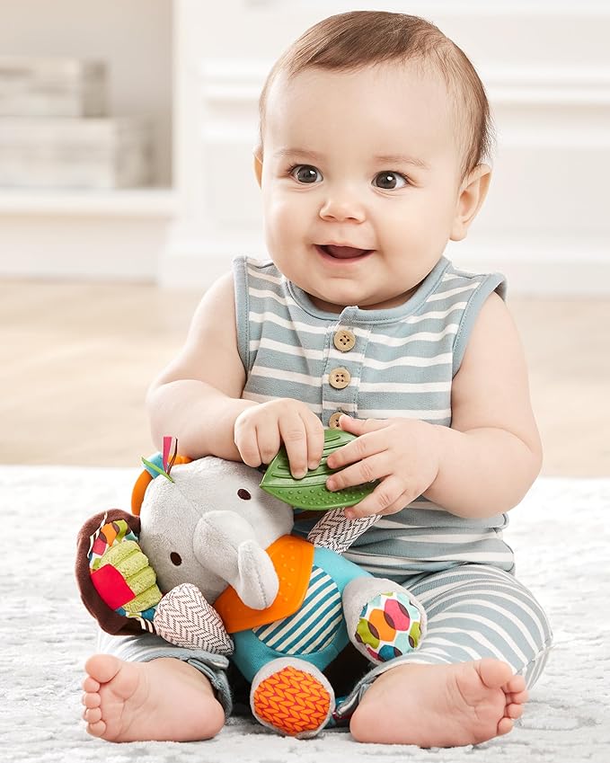 Infant Playing with Multi-Sensory Teething and Rattle Toy