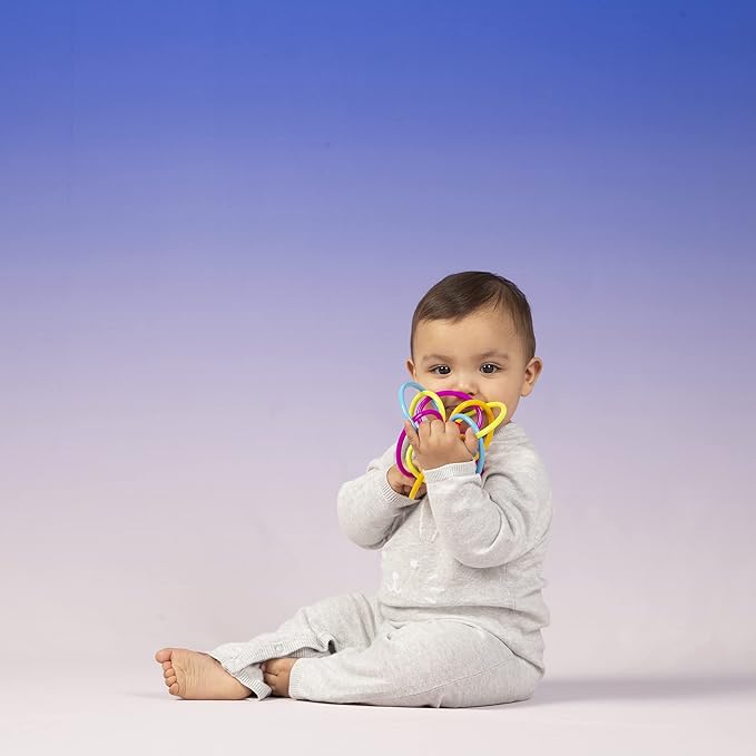 Close up of textured sensory loops on baby rattle teether