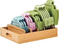 Bamboo cabinet organizer storing plastic container lids neatly