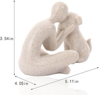Compact human and canine figurine displayed on a bedroom side cabinet