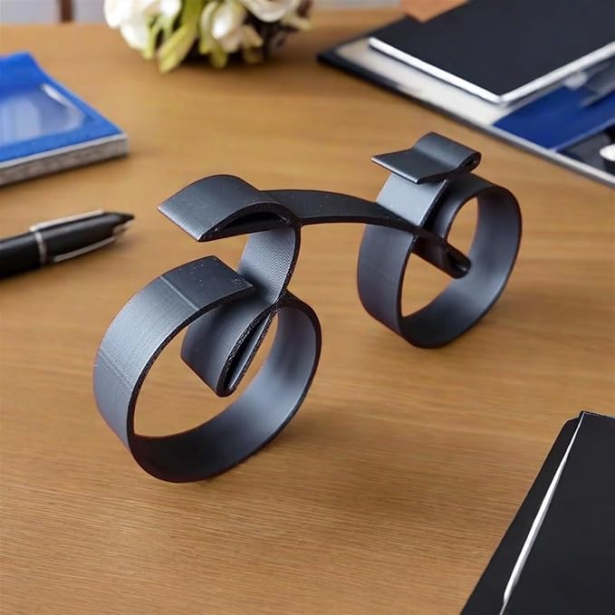 Abstract cycle silhouette ornament featuring an open linear structure