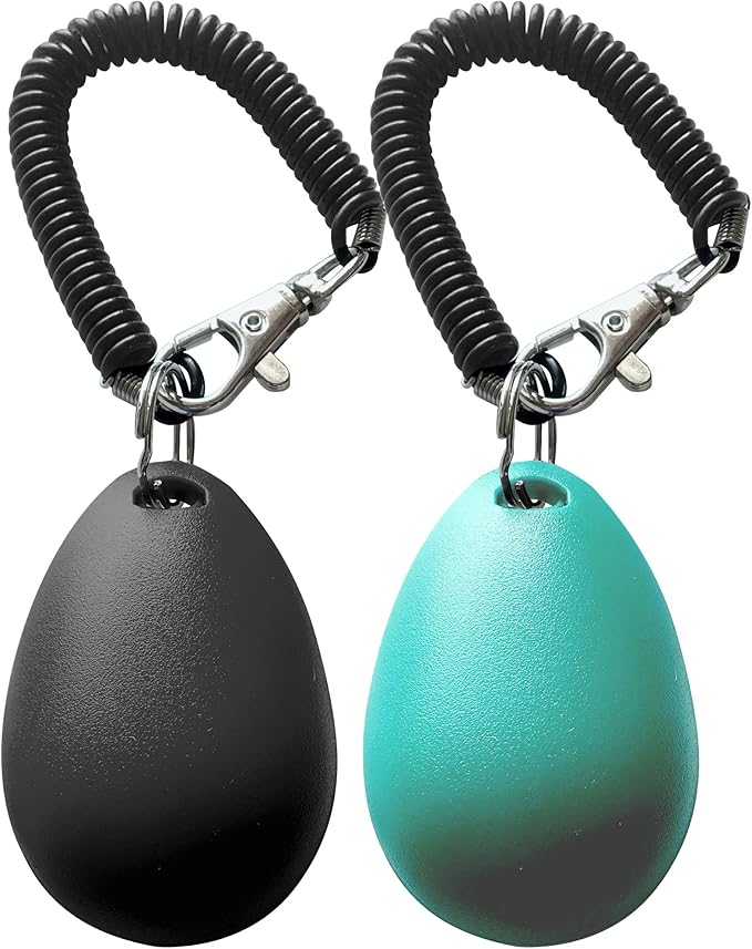Black and blue dog training clicker, ideal for obedience training.