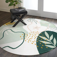 Soft round area rug placed near sofa and entryway