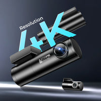 Car dashboard camera placed near windshield area for road view