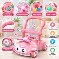 Car-style baby push toy with pink finish, activity panel and integrated walker handle