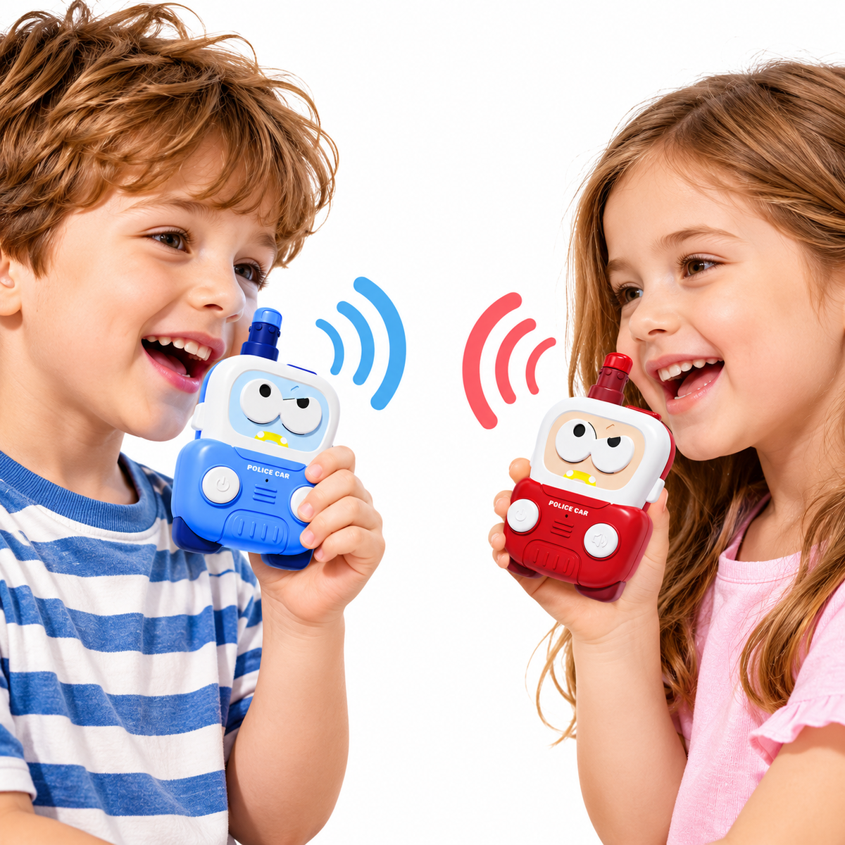 Close-up of colorful police car-themed toy walkie talkies featuring expressive cartoon faces and large buttons.