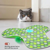 Indoor cat interacting with touch-activated moving feather toy