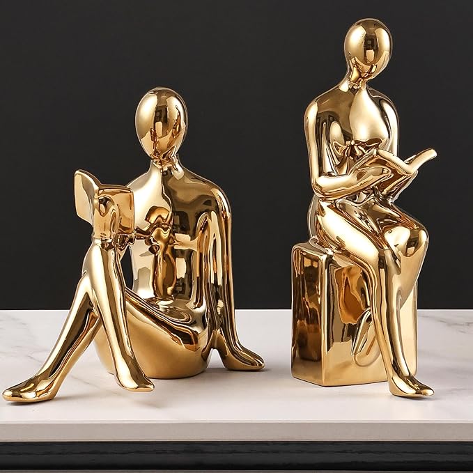 Close-up detail of the gold ceramic decorative book stopper