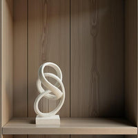 Elegant Abstract Ribbon Figurine in White
