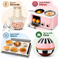 Pink 3-in-1 countertop cooking oven preparing multiple dishes
