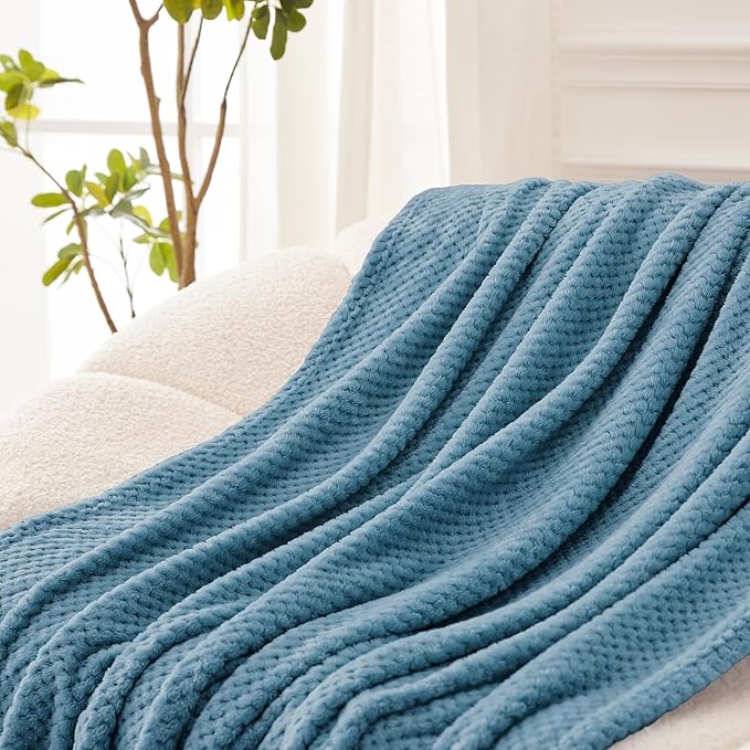 Decorative waffle fleece blanket on lounge chair