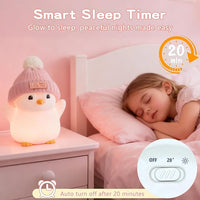 Cute penguin nursery lamp with warm LED glow for baby sleep comfort.