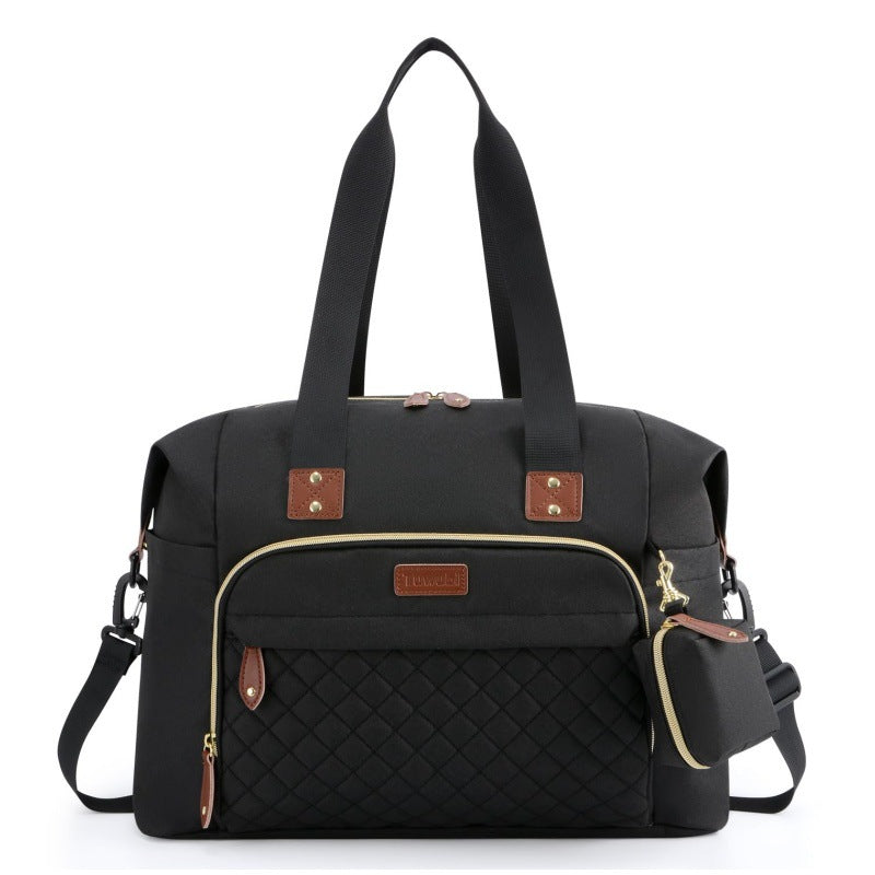 Diaper bag tote with pacifier case, large and spacious for baby essentials.