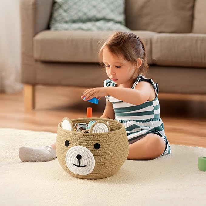 Diaper caddy basket made from cotton rope, great for organizing diapers and baby clothes.