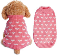 Soft pink knitted dog sweater with heart design for small dogs and cats.