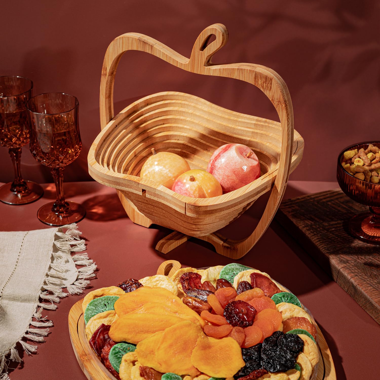 Colourful dried fruit varieties organised in sections on a gift tray