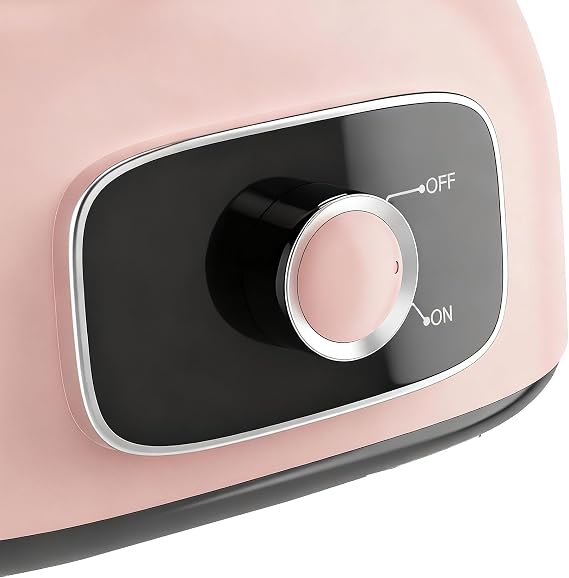 Pink electric candy floss maker with a compact countertop design for convenient home use and cleaning.