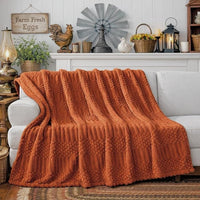 Rustic decorative fleece blanket in farmhouse living room