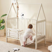 Flexible Baby Monitor Mount Attached To Baby Crib