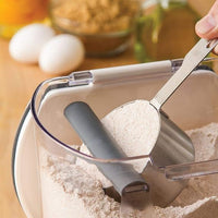 Clear flour storage container with fitted lid for organized kitchen pantry use.