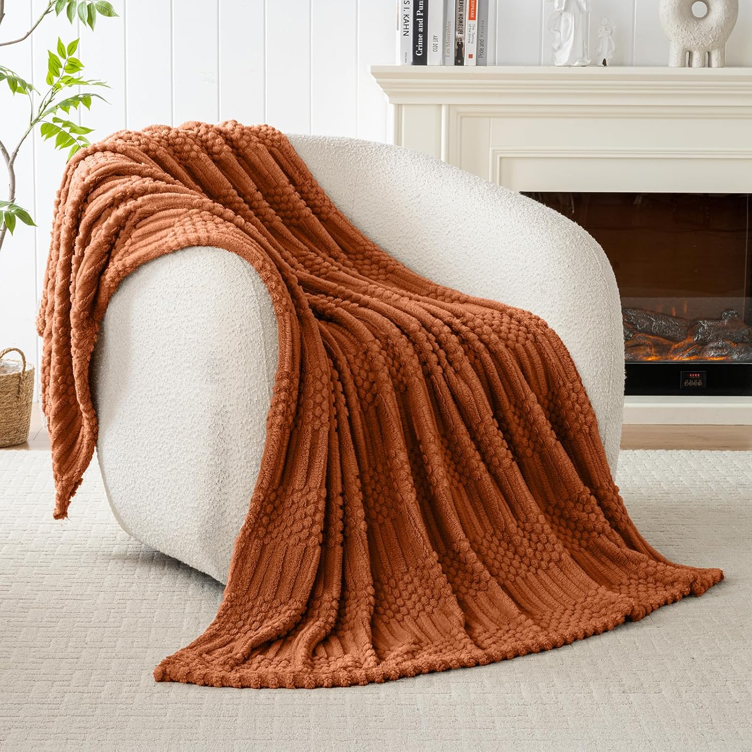 Aesthetic rust throw blanket on living room chair