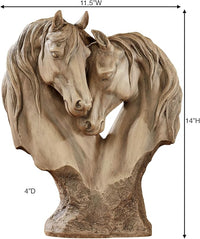 Side view highlighting the detailed faces and flowing manes of the equine ornament