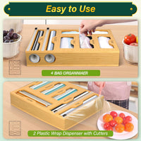 Kitchen drawer wrap dispenser with storage spaces for rolls and food bags.