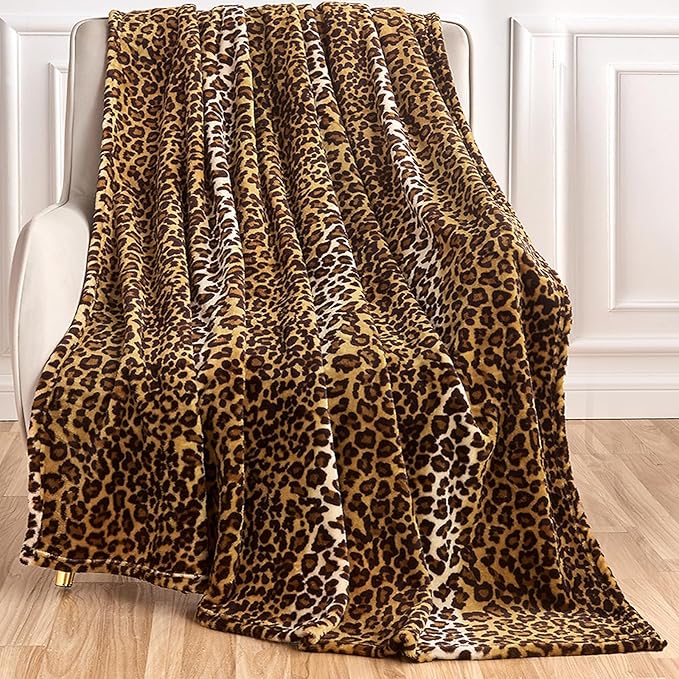 Soft dark brown cheetah print blanket on sofa