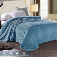 Soft fuzzy blanket draped over living room sofa