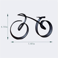 Minimal cycle statue styled on a living room side table with books