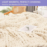 Plush chunky knit blanket folded on bedroom chair