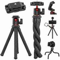 Mini flexible camera tripod with hidden phone holder for photos and videos