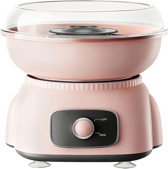 Mini pink electric candy floss machine for making fresh, fluffy cotton candy at home.