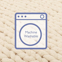 Elegant knitted chenille blanket enhancing minimalist décor