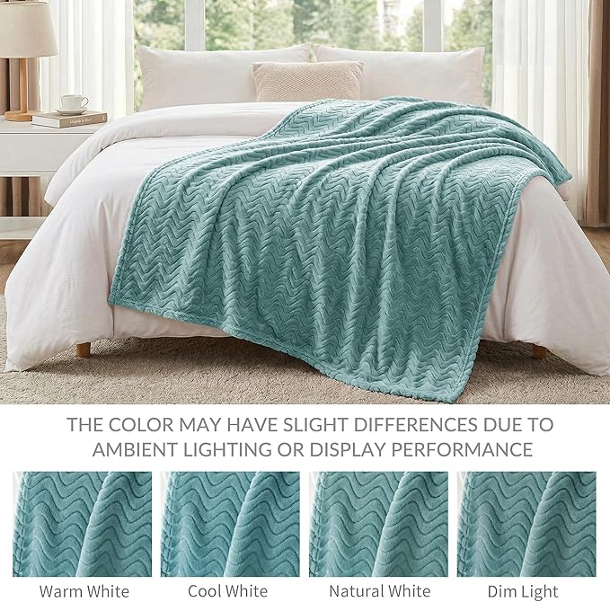 Elegant woven throw blanket in celadon green shade