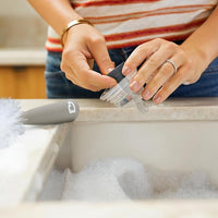 Multi-purpose sponge brush, ideal for cleaning baby bottles, mugs, and jars.